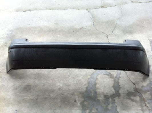 VW POLO MK2 2003- 4 DOOR REAR BUMPER PRIMED BLK WITH STRIP